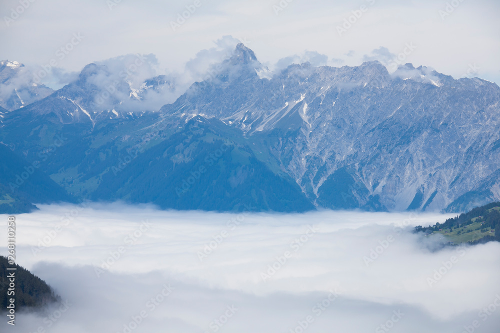 Mountain view with valley covered in clouds in Montafon Austria Mountain view with valley covered in clouds in Montafon Austria