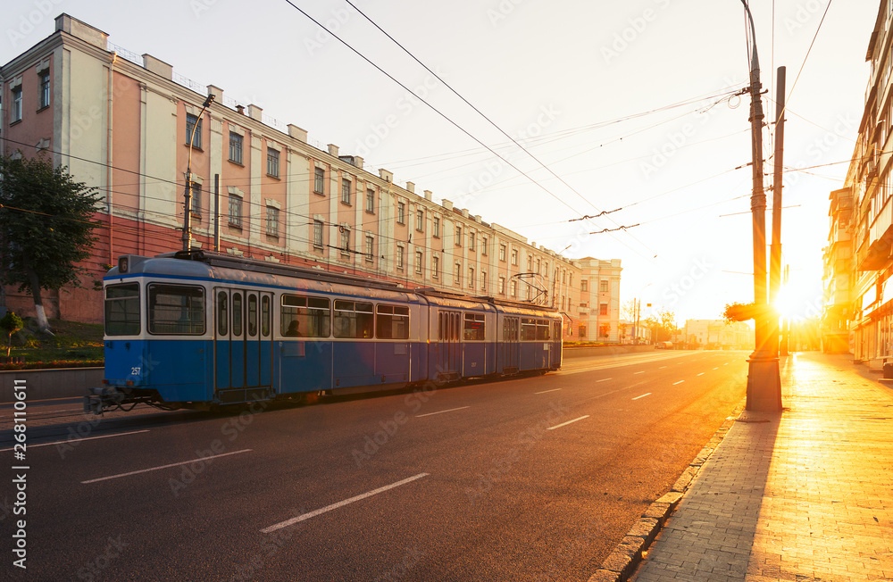 Tram in old European city at the morning Tram in old European city at the morning