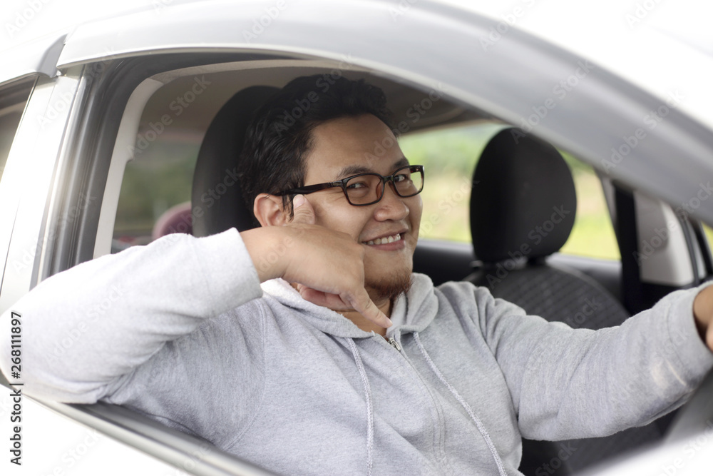 Male Driver Shows Call Me Gesture Male Driver Shows Call Me Gesture