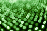 Abstract bokeh background. Soft defocused lights. Neon basic green color