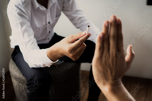 World No Tobacco Day in May  stop smoking concept  young man against cigarette