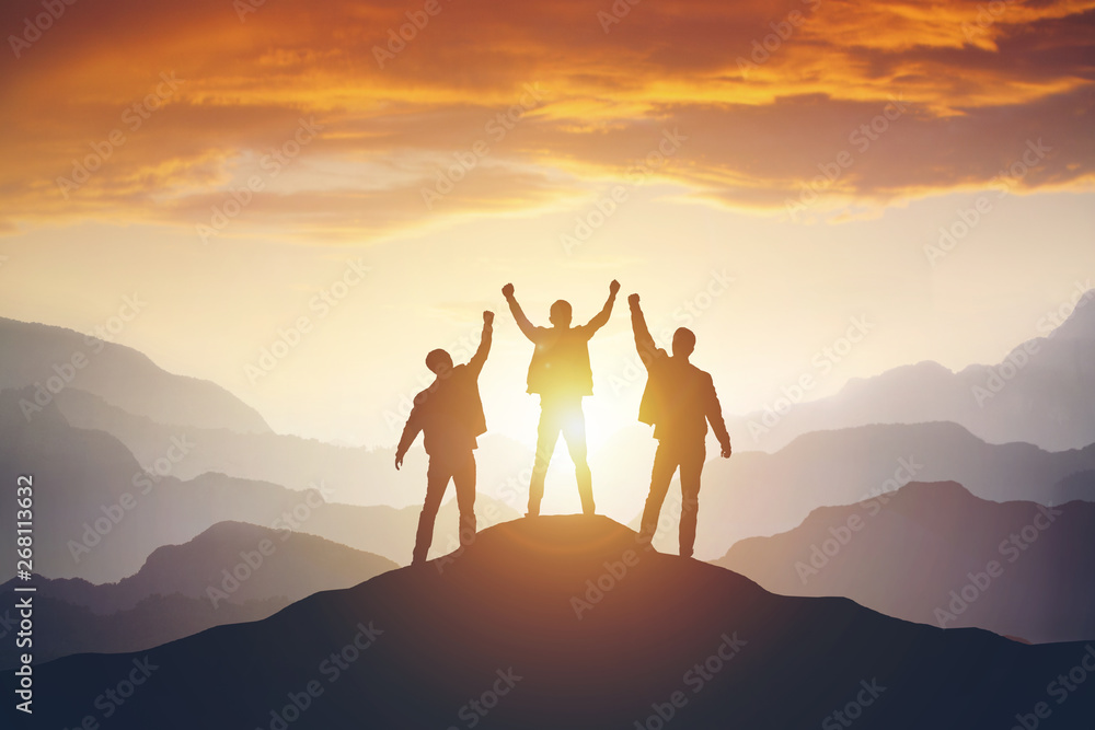 Silhouette of the team on the mountain Silhouette of the team on the mountain