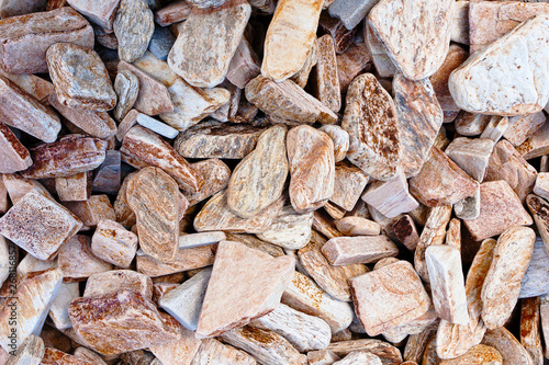 Beige gravel stone floor texture background