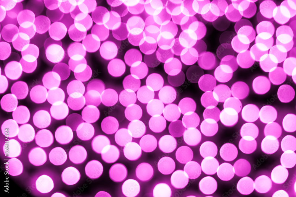 Abstract bokeh background. Soft defocused lights. Neon basic pink color