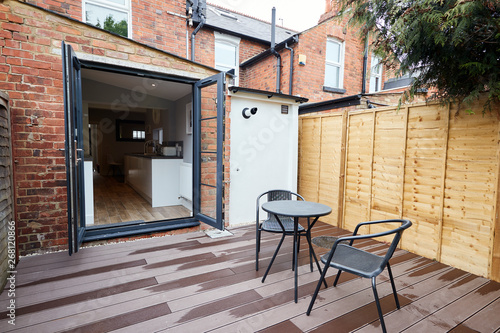Patio area at the back of a newly refurbished terraced house photo