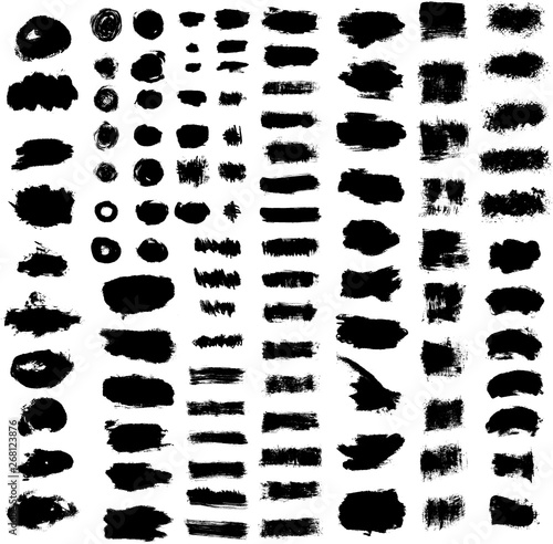 Large set different grunge brush strokes. Dirty artistic design elements isolated on white background. Black ink vector brush strokes
