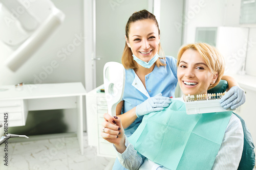 Female dentist working with a patient girl