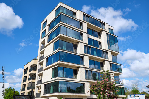 Modern multi-family house with a lof of glass seen in Berlin, Germany