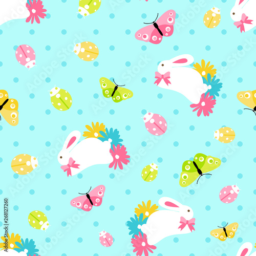 Seamless pattern with easter spring bunny in flowers on blue background