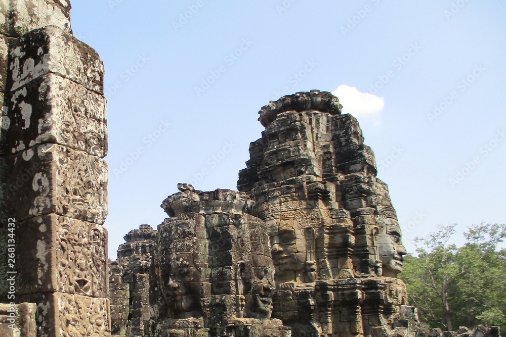 Fototapeta premium Cambodia Angkor Wat Bayon Head. Stone face of god on top of Angkor Thom.
