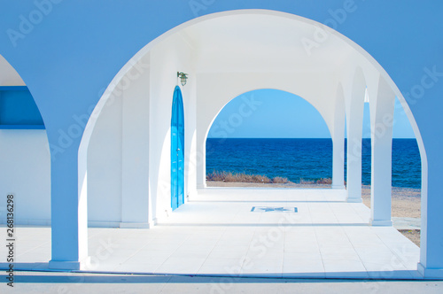White Ayia Thekla Chapel with arched doors near Agia Napa © shinedawn