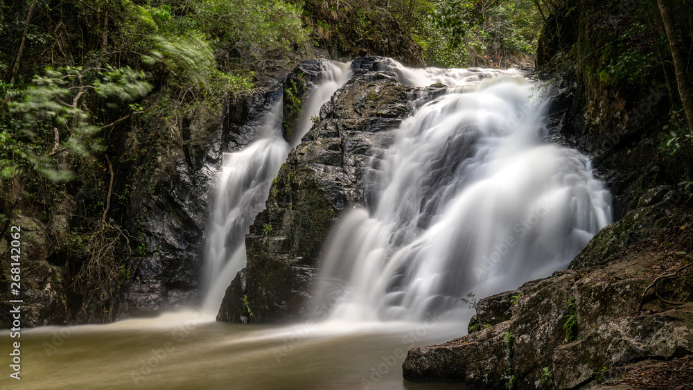 Dinner falls waterfall at Mount Hypipamee, tropical north Queensland, Australia Dinner falls waterfall at Mount Hypipamee, tropical north Queensland, Australia