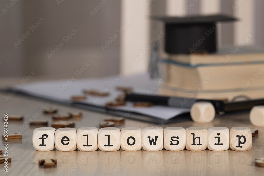 Word FELLOWSHIP composed of wooden dices. Word FELLOWSHIP composed of wooden dices.