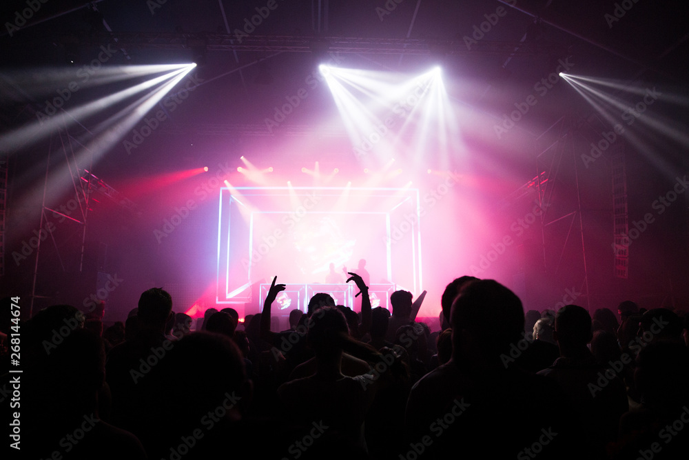 Fans enjoying a music festival Fans enjoying a music festival