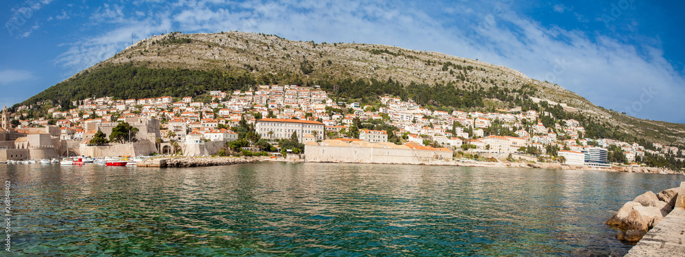 Mediterranean panorama of the beautiful Dubrovnik old city including Mount Srd, the old port, city walls and fortifications