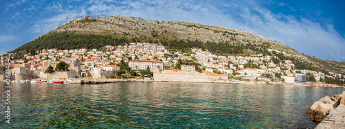 Mediterranean panorama of the beautiful Dubrovnik old city including Mount Srd, the old port, city walls and fortifications