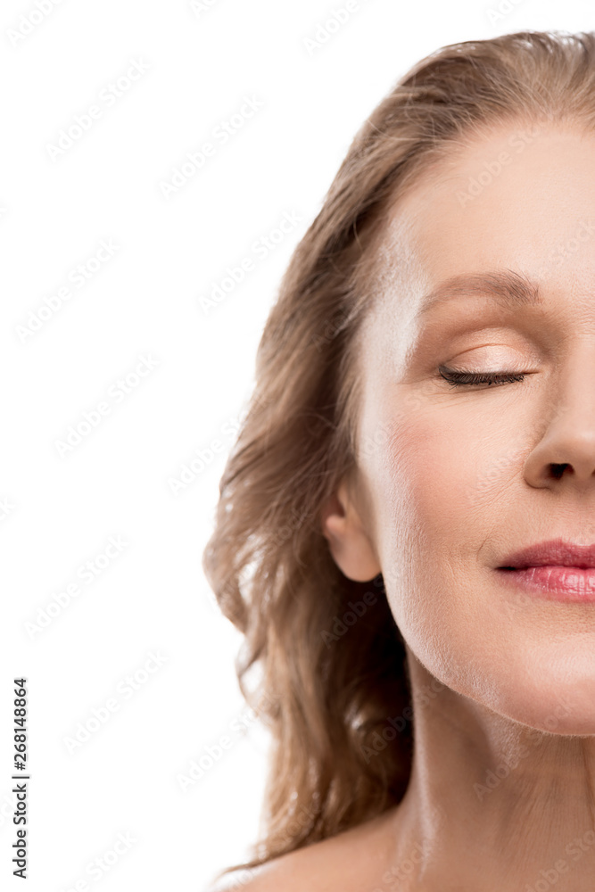 Cropped view of beautiful middle aged woman with clean face Isolated On White Cropped view of beautiful middle aged woman with clean face Isolated On White