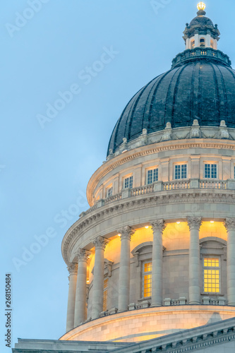 Dome of Utah State Capital Building with pale blue sky in the background