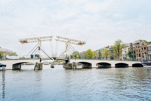 Photography Amsterdam, Netherlands September 5, 2017: Magere Brug Bridge and Amstel river