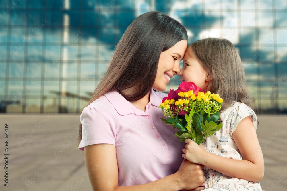 Happy Mother and daughter hugging Happy Mother and daughter hugging