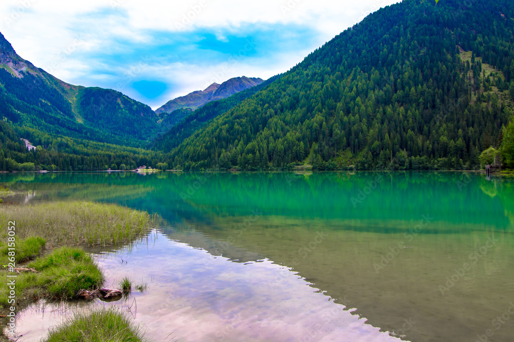 Fototapeta premium The Antholzer See a lake in South Tyrol, Italy