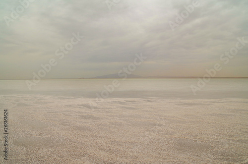 Fototapeta Naklejka Na Ścianę i Meble -  Sunrise. Salt Lake Karum (also known as Lake Assale or Asale) it lies at −120 m (−394 ft) relative to sea level. Ethiopia, Afar Region, Danakil Depression (Afar Triangle or Afar Depression)