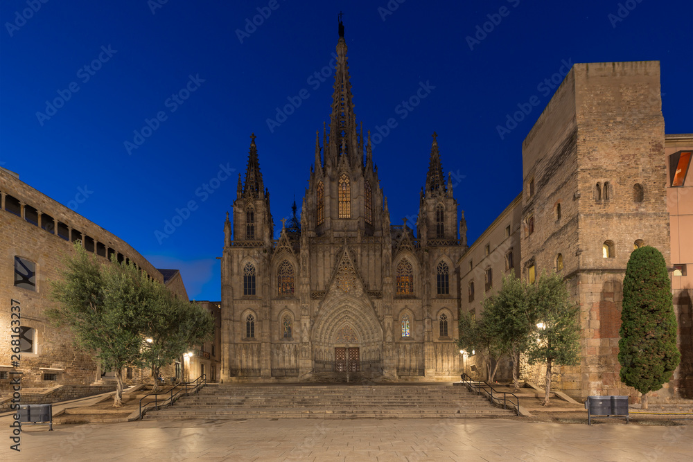 Panorama of Barcelona Cathedral of the Holy Cross and Saint Eulalia during morning blue hour, Barri Gothic Quarter in Barcelona, Catalonia, Spain.