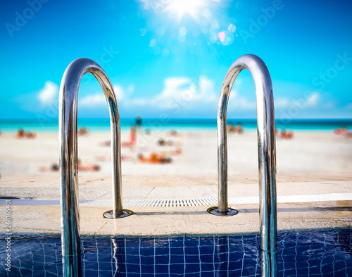 Swimming pool background and summer beach 