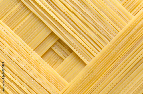 Geometric pattern of pasta Bavette made from durum wheat.