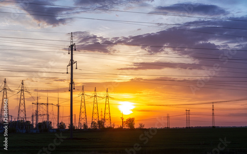 electric wires and towers at sunset.