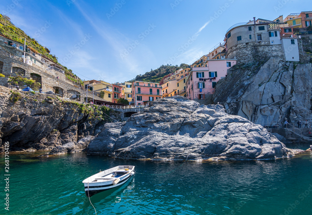 Cinqueterre, Italy . 04-19-2019. Little fishing boat at manarola harbor one of five villages of Cinqueterre. Liguria. Italy.