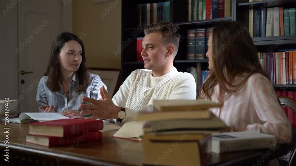 A group of young people holding interactive games and sharing experience A group of young people holding interactive games and sharing experience