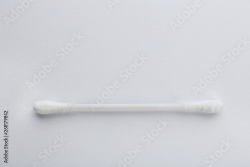 Plastic cotton swab on white background, top view