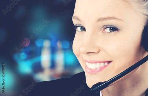 Woman Call Center operator on dark background