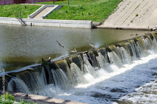 Wild swirling water released from irrigation dam