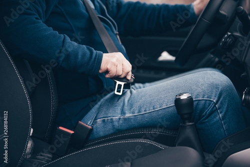 passenger  senior man fastening seat belt in the car, transport and  safety concept © Khaligo