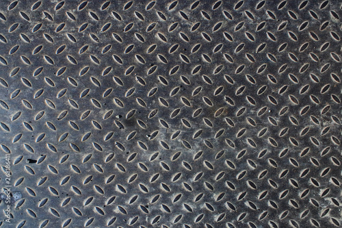 Close up of an used metal anti slip plate