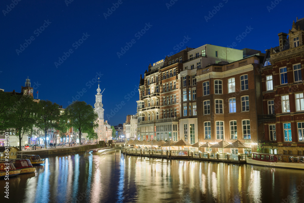 Amsterdam, Holland - May 13, 2019: Night view of the Amsterdam canals