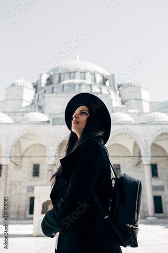 Woman standing in front of S?leymaniye Mosque in Istanbul photo