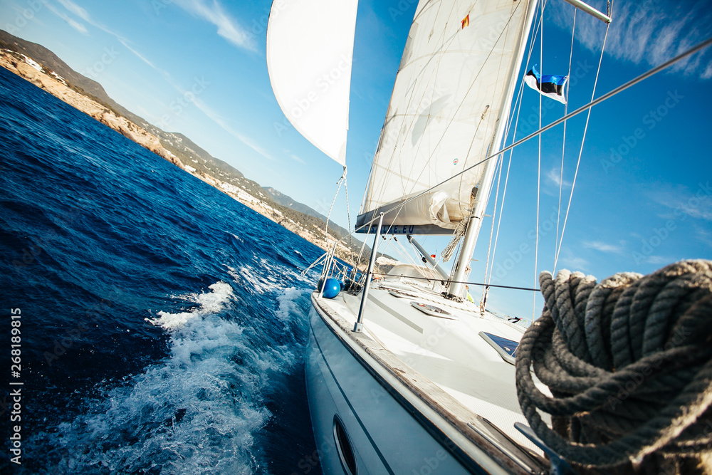 Obraz premium Sailing. Ship yachts with white sails in the open Sea