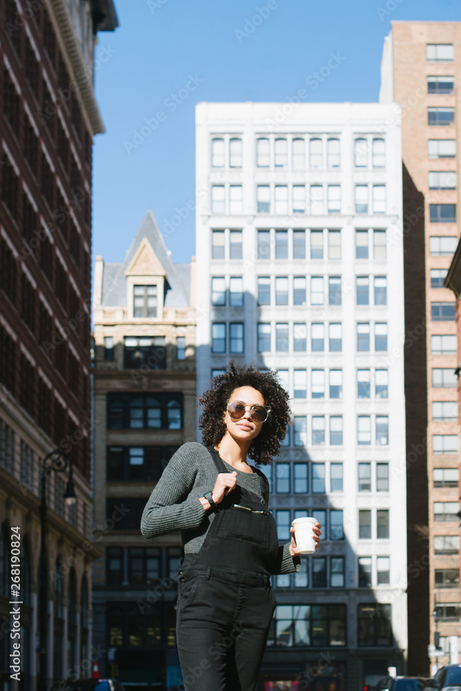 Young woman hanging with coffee in city Young woman hanging with coffee in city