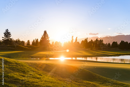 Sun Reflecting on Golf Course Lake