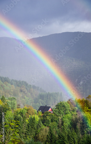 Rainbow over house