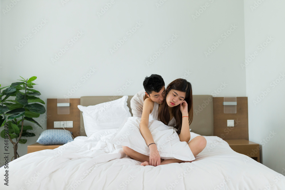 Young couple in bedroom Young couple in bedroom