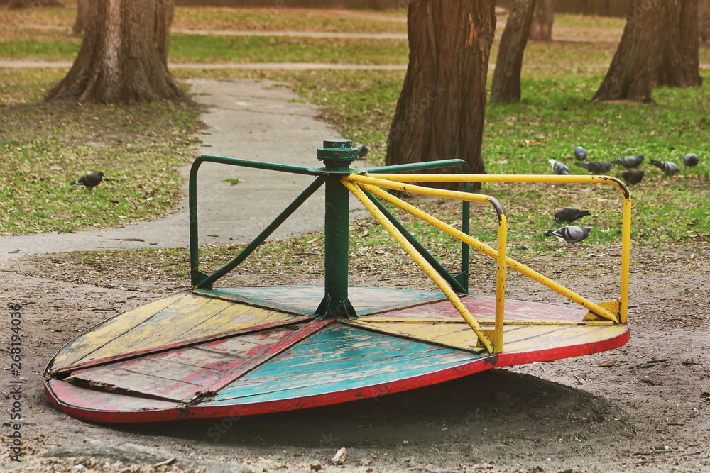 Old swing in the park. Broken swing Old swing in the park. Broken swing
