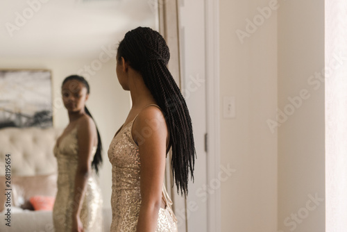 teen African American getting ready for prom