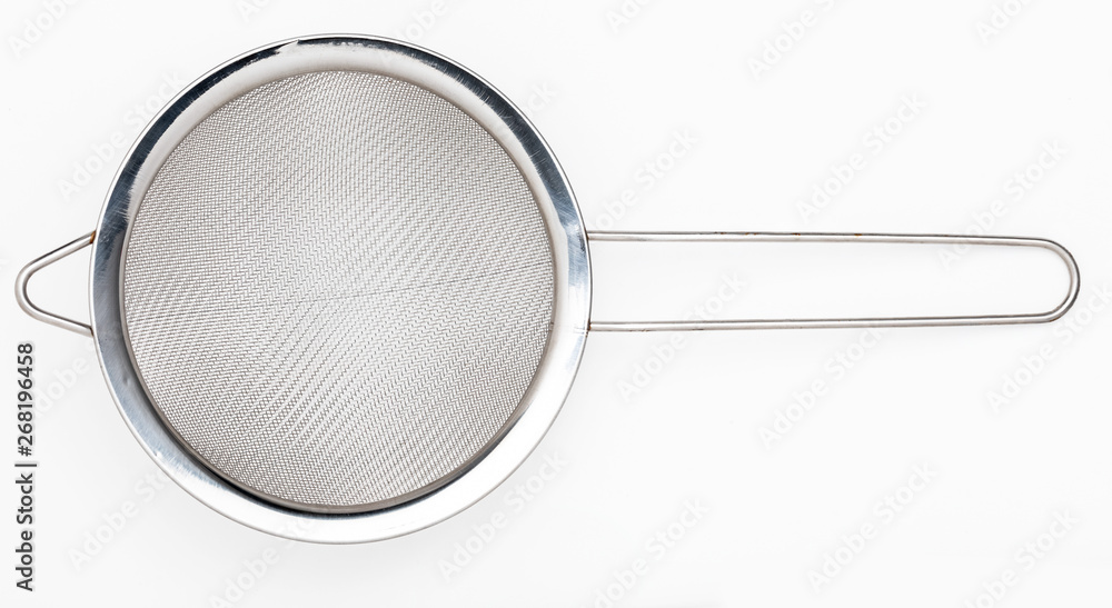 Metallic colander for cooking (kitchenware collection). Isolated on white background. Metallic colander for cooking (kitchenware collection). Isolated on white background.