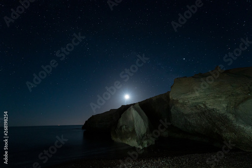 Night landscape with Moon on the coast of the Escullos. Natural Park of Cabo de Gata. Spain.