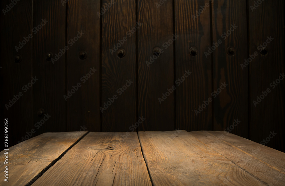 Empty wooden table in front of abstract blurred background of coffee shop . can be used for display or montage your products.Mock up for display of product Empty wooden table in front of abstract blurred background of coffee shop . can be used for display or montage your products.Mock up for display of product