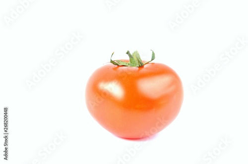 ripe tomato on a white background